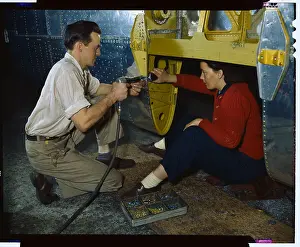Woman and Man Working During World War II