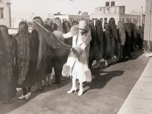 Woman Measuring Long Hair In Contest