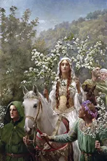 A woman in medieval dress rides a white horse holding flowering branches, surrounded by people in green cloaks in a natural landscape
