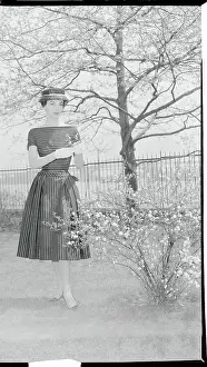 Woman Modeling an Afternoon Dress