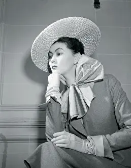 Woman Modeling Christian Dior Ensemble