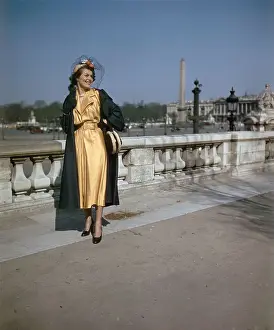 Goat Prints: Woman Modeling Dress and Coat