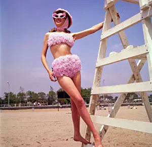 Modeling Prints: Woman Modeling in Flowery Bikini