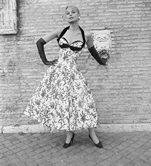 Woman Modeling a Gown