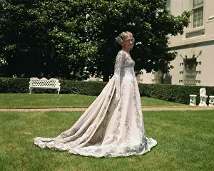 Woman Modeling Gown on Lawn