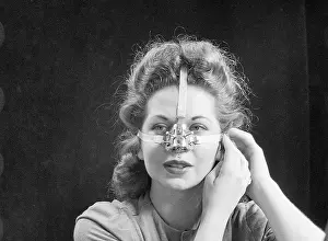 Body Image Prints: Woman Modeling Nose Shaping Device