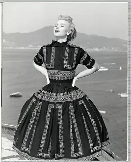 Belt Prints: Woman Modeling Pompadour Print Dress