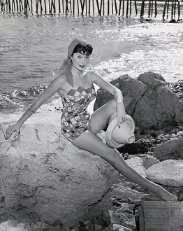 Modeling Prints: Woman Models Swimsuit/Design of Squares