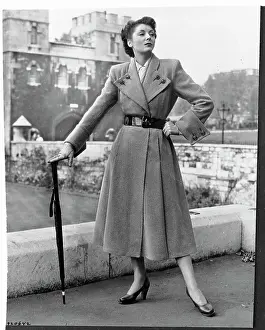 Woman Models Tweed Coat
