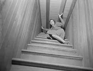 Folly Prints: Woman on Narrow Staircase at Winchester Mystery House