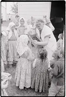 Woman in Old Believers Sect Shares Chocolate