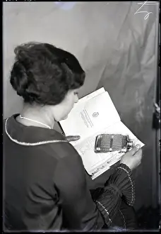 Flask Prints: Woman Opening Book Containing Flask