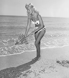 Strapless Prints: Woman Opening a Parasol on the Beach