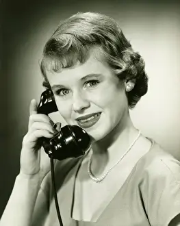 1950s Style Prints: Woman on phone posing in studio, (B&W), (Close-up), (Portrait)