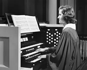 Religious Music Prints: Woman playing organ in church