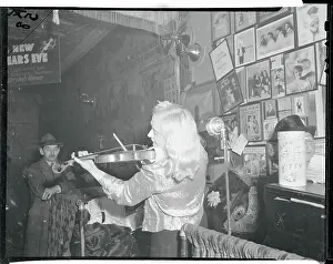 Woman Playing Violin at Nightclub