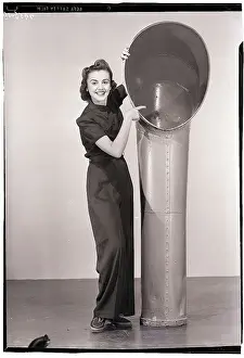 Woman Pointing into Vent Pipe