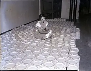 Oppression Prints: Woman Polishing Piles of Plates