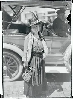 Robinson Prints: Woman Posing in Elaborate Attire Near Car