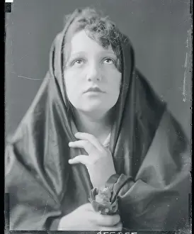 Graceful Prints: Woman Posing in Headdress