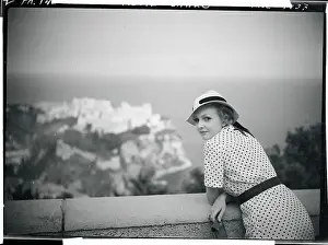 Woman Posing in Front of Monte Carlo Scenery