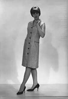 1960s Fashion Gallery: Woman posing in studio, (B&W)