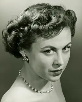 Neat Prints: Woman posing in studio, (B&W), portrait