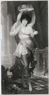 Woman Posing with Tambourine Above Her Head