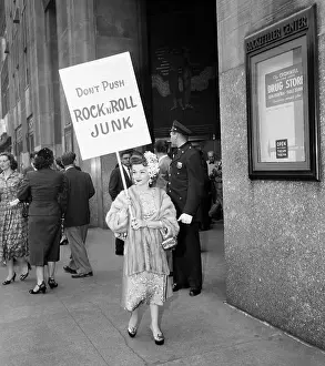 Woman Protesting Rock and Roll Music