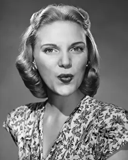 Woman puckering lips