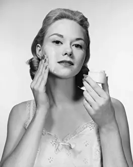 Moisturizer Prints: Woman putting cream on face