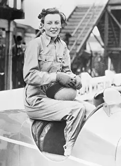 Racing Paddock Prints: Woman Racing Driver Posing for Picture