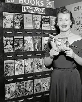 Convenience Prints: Woman Reading Book by Book Vending Machine