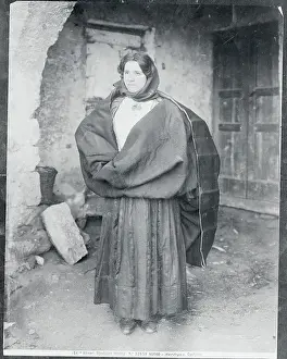 Woman in Sardenian Costume and Carrying Backpack