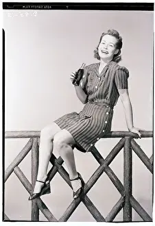 Soda Prints: Woman Seated on Fence with Bottle of Soda