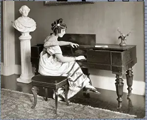 Woman Seated At Spinet In Empire Dress