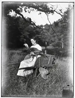 Wheelbarrow Prints: Woman Seated On Wheelbarrow;Turkey In La