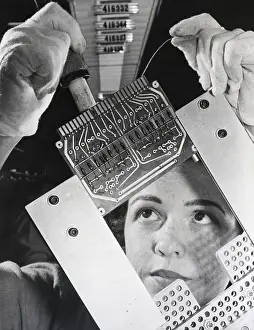 Assembly Line Prints: Woman Seen Through Circuitboard Working