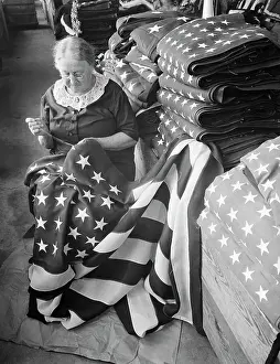 Sewing Prints: Woman Sewing Stars on Custom Flag