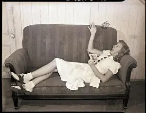 Shock Prints: Woman Shocked by Greeting Card Butterfly