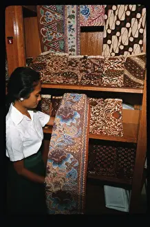 Java Prints: Woman Showing Batik Material