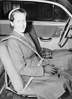 Woman Showing Seat Belt Usage in Car