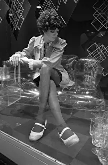 Woman Sitting in Chair
