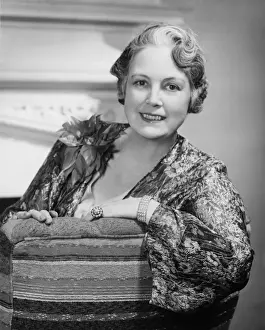 Well Groomed Prints: Woman sitting on couch, (B&W), close-up, portrait