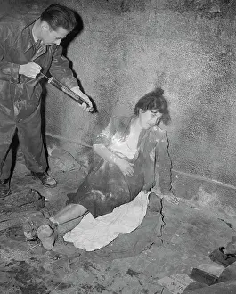 Naples Prints: Woman Sitting on Ground Under Spray Attack