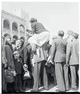 Woman Sitting on a Man's Shoulders