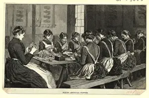Woman Sitting at Table Making Artificial Flowers