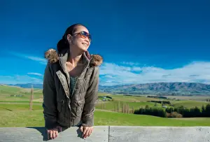 Coolbiere Collection Prints: Woman smile with hilly landscape background