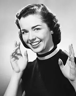 Non Moving Activity Prints: Woman smiling, displaying hands