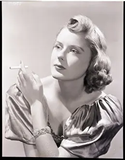 Bracelet Prints: Woman Smokes While Modeling Negligee
